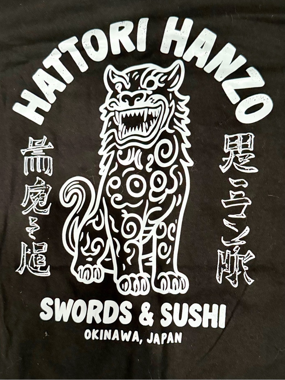 Halo Black Graphic Short Sleeve Tee with White Shisa Design